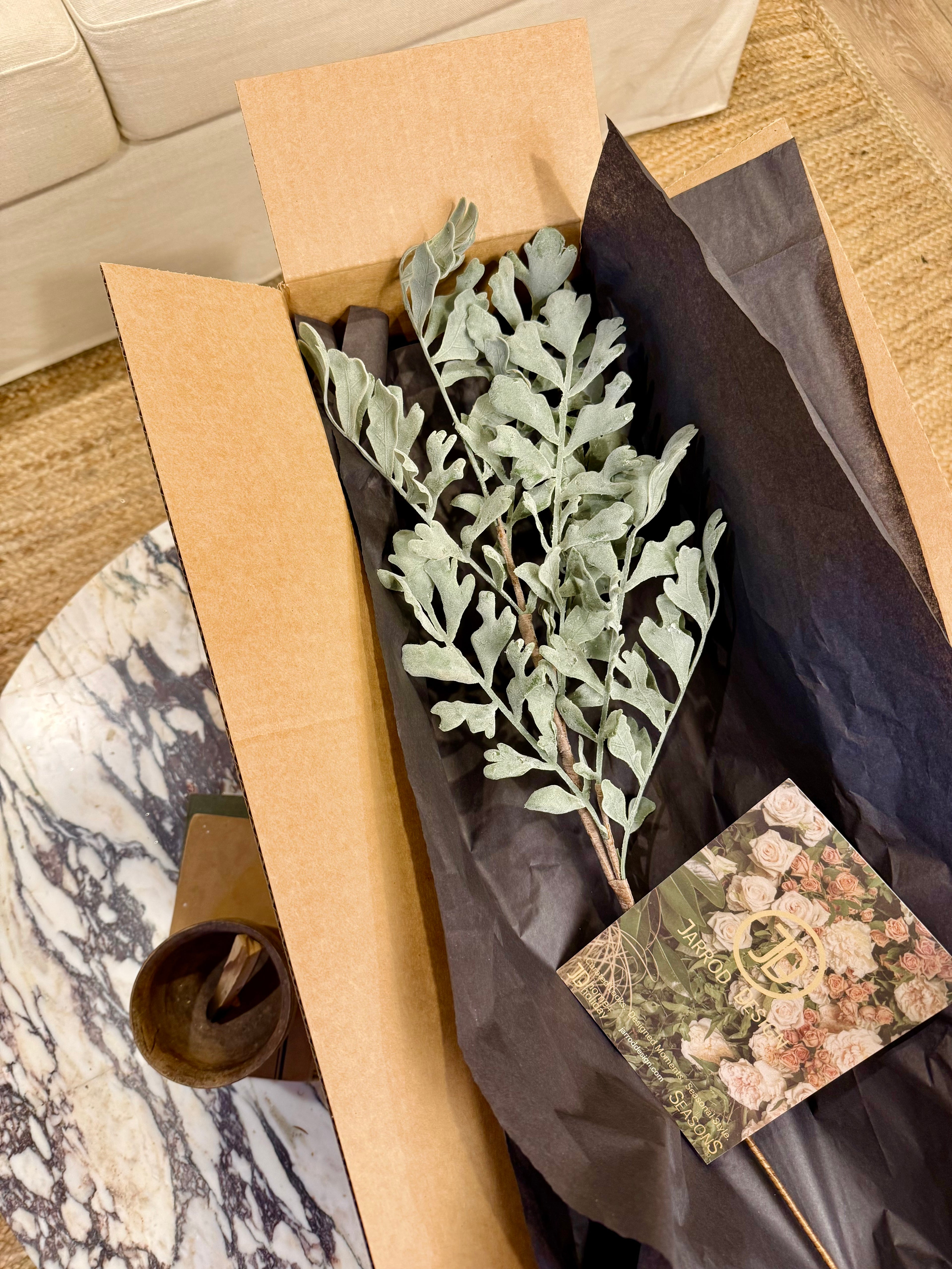 Frosted Leaf Stem: 28" Snow-Dusted Winter Greenery