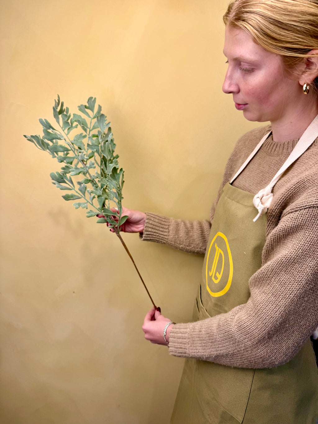 Frosted Leaf Stem: 28" Snow-Dusted Winter Greenery